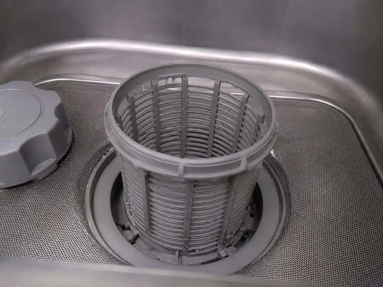 Clean, clear dishwasher filter after service