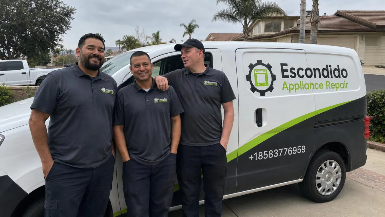 The Escondido Appliance Repair crew standing in front of their branded service van